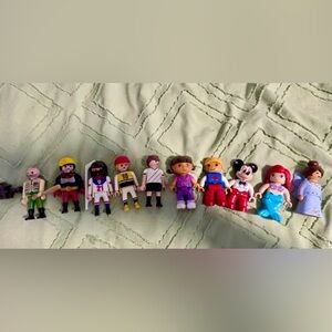 Assorted Playmobile characters and accessories